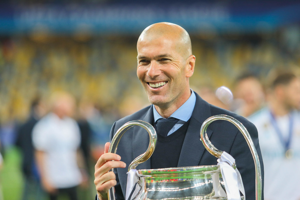 What qualities make a former footballer a successful coach?